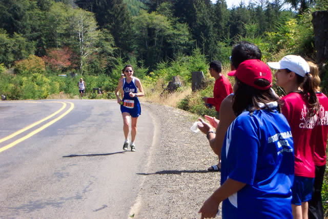 Michelle crests the top of a tough hill