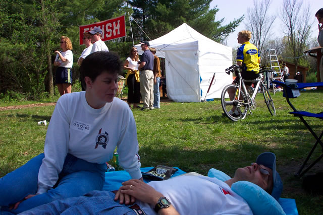 Kris Davenport watches over Michael after his 8th Ice Age Trail 50 Mile run
