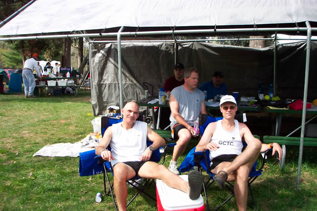 Larry Hall and Michael Davenport in front of the scorer's tent