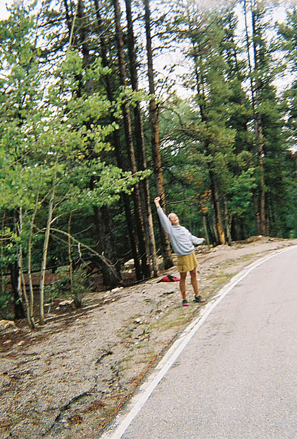 Jenn Shelton cheering on runners nearing Fish Hatchery