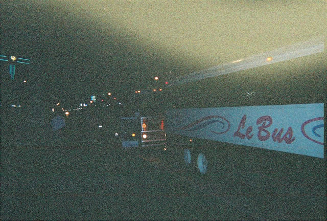 Busses load and deliver runners to the start