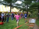 Kathleen Rytman of Cudahy, WI and Aaron Benike of Rochester, MN head into the finishing chute