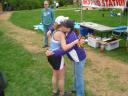 Julie Bane getting congrats with Belt Buckle.