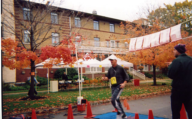 Steve Edsey crossing the finish line