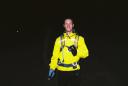 Matt Nyquist of Michigan helps pace Bill through a 3.5 mile section of night running