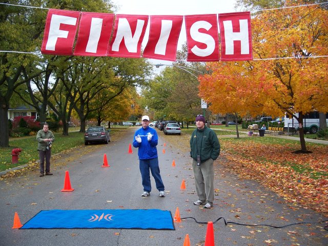 Race officials Mike Odea and Peter Block at the finish line