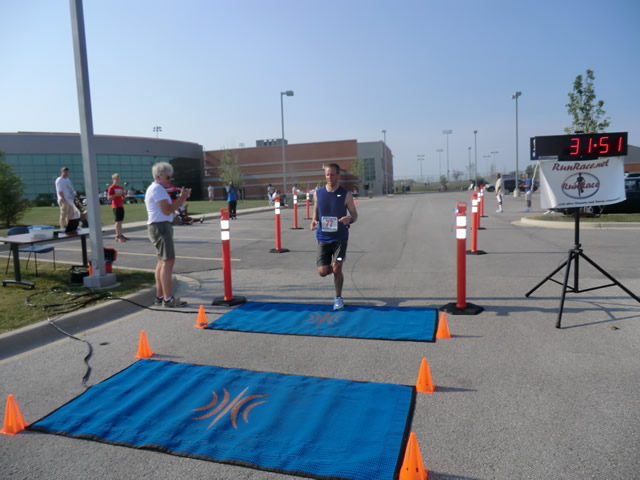 Saturday June 30, 2012 - Runners making the finish of The Great 8K!