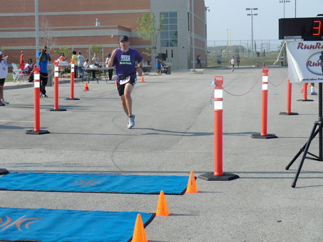 Saturday June 30, 2012 - Runners making the finish of The Great 8K!