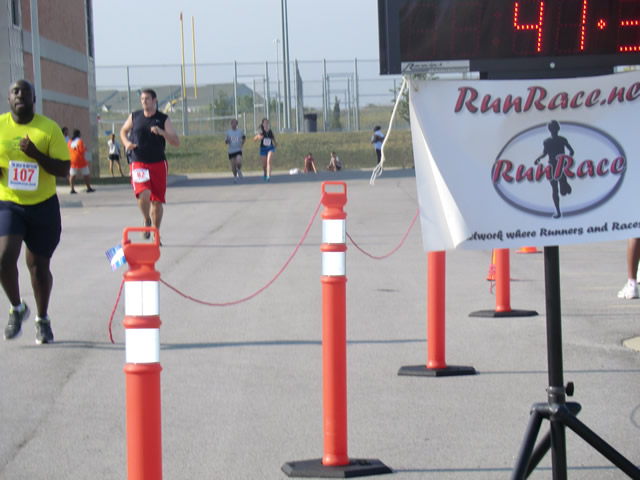 Saturday June 30, 2012 - Runners making the finish of The Great 8K!