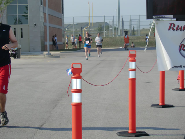 Saturday June 30, 2012 - Runners making the finish of The Great 8K!
