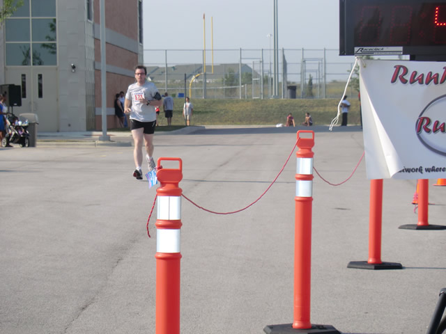 Saturday June 30, 2012 - Runners making the finish of The Great 8K!