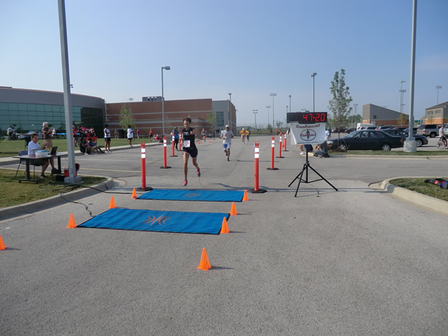Saturday June 30, 2012 - Runners making the finish of The Great 8K!