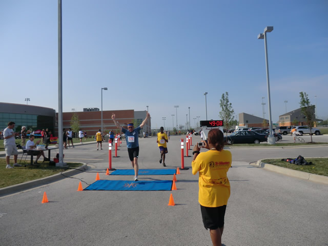 Saturday June 30, 2012 - Runners making the finish of The Great 8K!