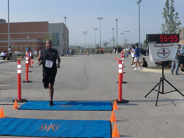 Saturday June 30, 2012 - Runners making the finish of The Great 8K!
