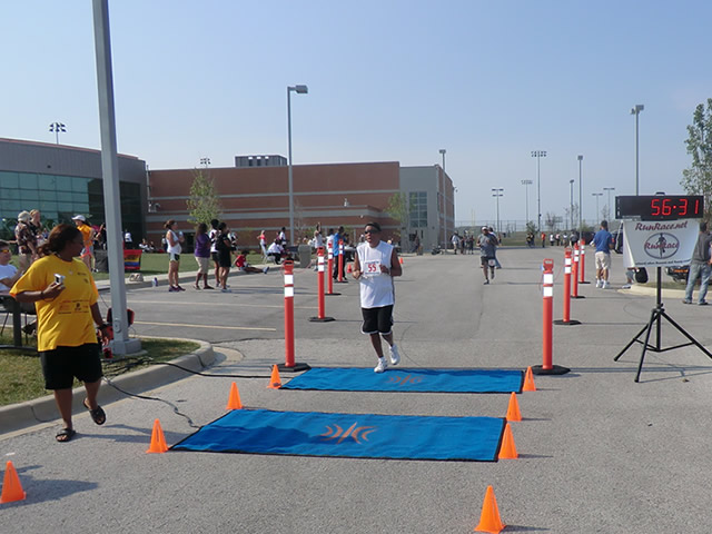 Saturday June 30, 2012 - Runners making the finish of The Great 8K!