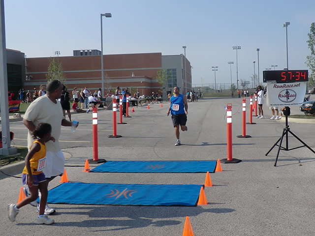 Saturday June 30, 2012 - Runners making the finish of The Great 8K!