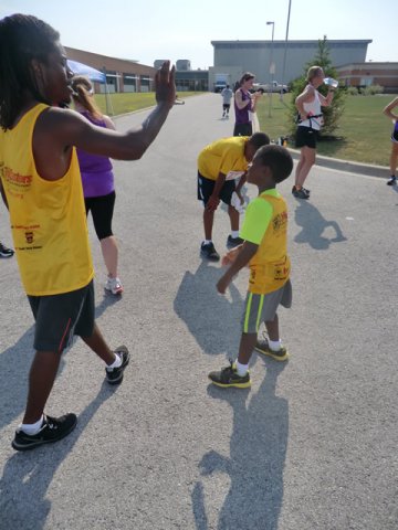 Saturday June 30, 2012 - Runners making the finish of The Great 8K!