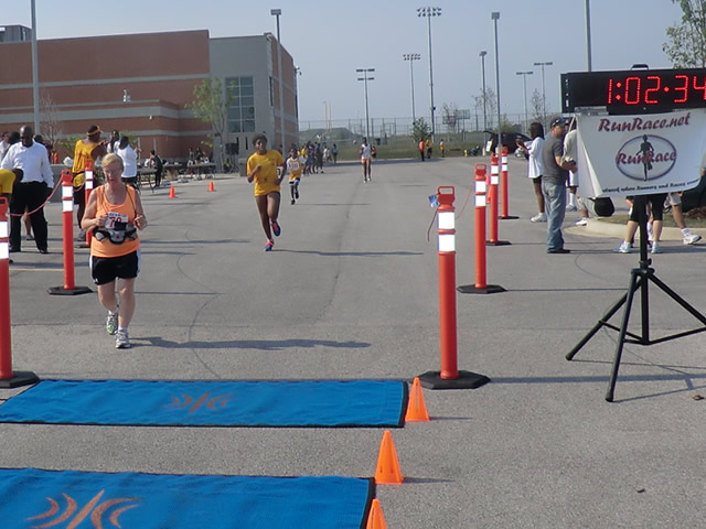 Saturday June 30, 2012 - Runners making the finish of The Great 8K!