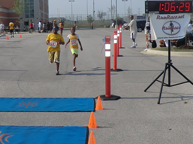 Saturday June 30, 2012 - Runners making the finish of The Great 8K!