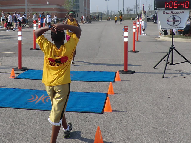 Saturday June 30, 2012 - Runners making the finish of The Great 8K!