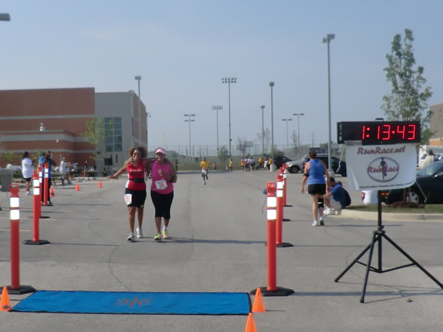 Saturday June 30, 2012 - Runners making the finish of The Great 8K!
