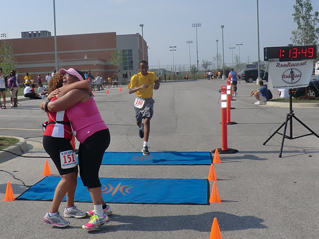 Saturday June 30, 2012 - Runners making the finish of The Great 8K!
