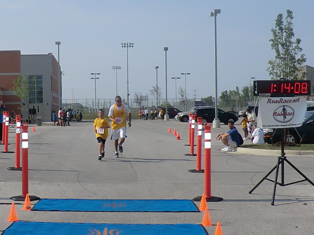 Saturday June 30, 2012 - Runners making the finish of The Great 8K!