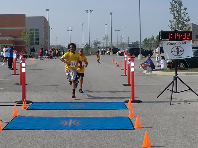 Saturday June 30, 2012 - Runners making the finish of The Great 8K!