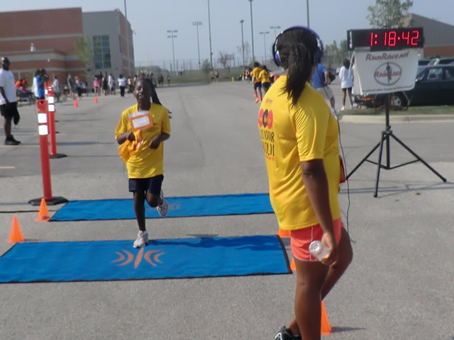 Saturday June 30, 2012 - Runners making the finish of The Great 8K!