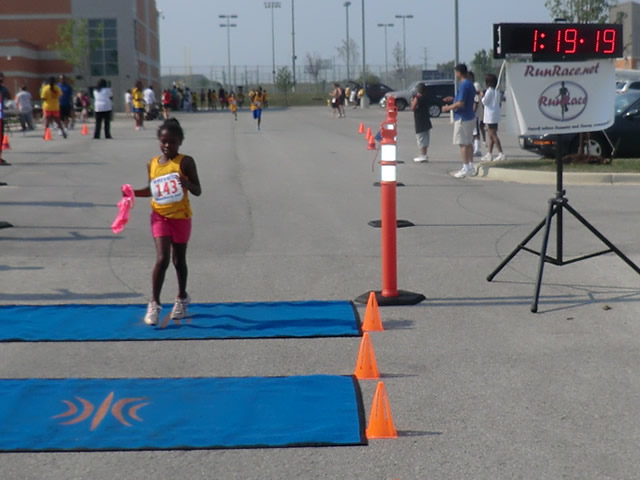 Saturday June 30, 2012 - Runners making the finish of The Great 8K!