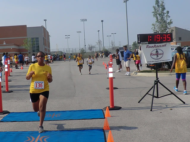 Saturday June 30, 2012 - Runners making the finish of The Great 8K!