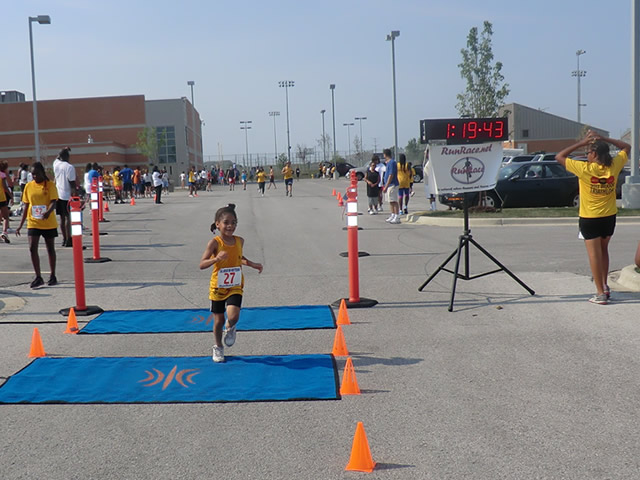 Saturday June 30, 2012 - Runners making the finish of The Great 8K!