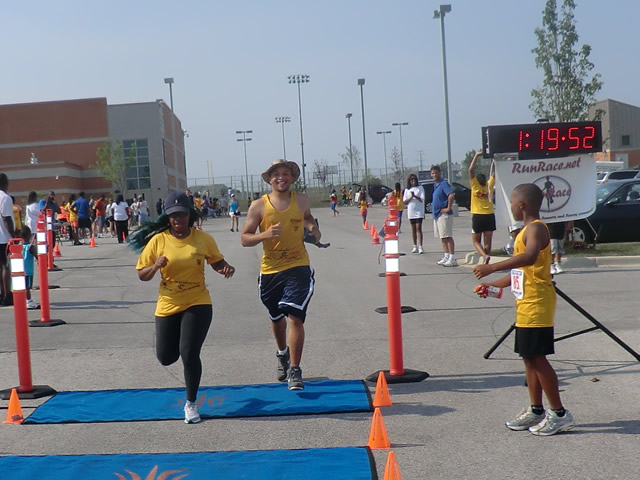 Saturday June 30, 2012 - Runners making the finish of The Great 8K!