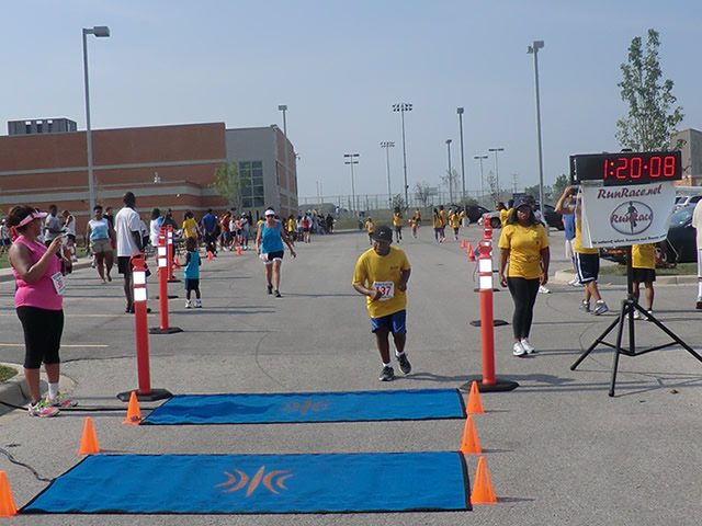 Saturday June 30, 2012 - Runners making the finish of The Great 8K!
