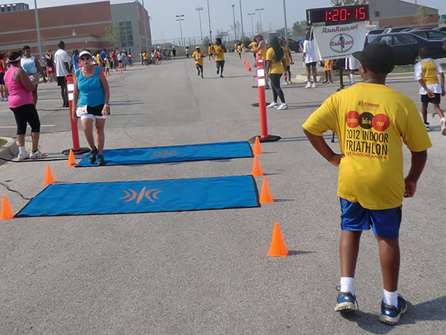 Saturday June 30, 2012 - Runners making the finish of The Great 8K!