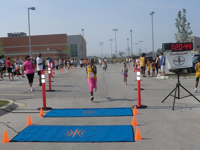 Saturday June 30, 2012 - Runners making the finish of The Great 8K!