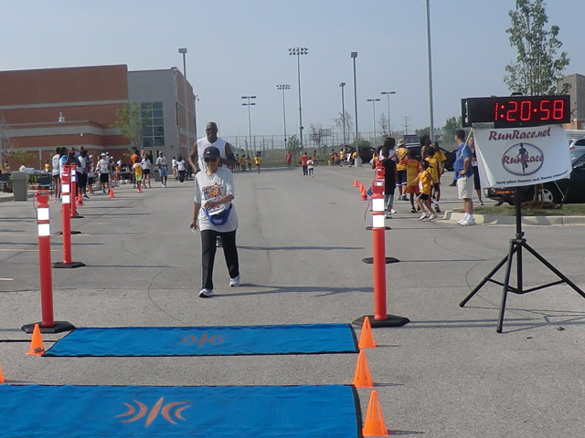 Saturday June 30, 2012 - Runners making the finish of The Great 8K!