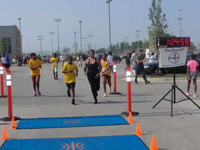 Saturday June 30, 2012 - Runners making the finish of The Great 8K!