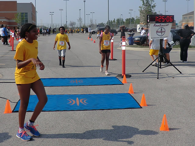 Saturday June 30, 2012 - Runners making the finish of The Great 8K!