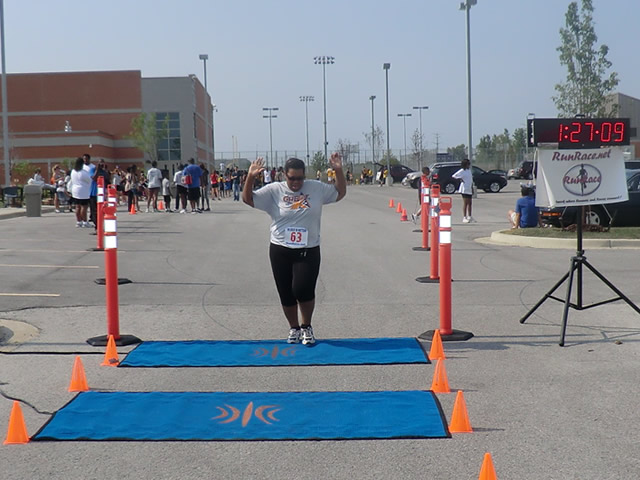 Saturday June 30, 2012 - Runners making the finish of The Great 8K!
