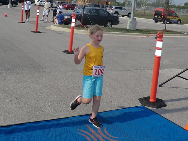 Saturday June 30, 2012 - Runners making the finish of The Great 8K!