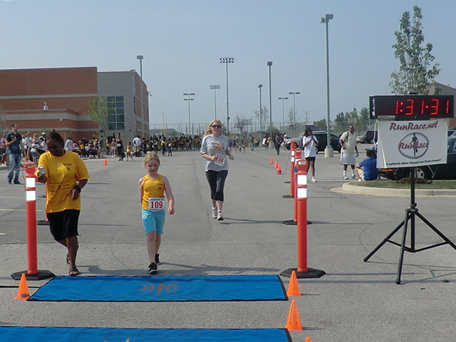 Saturday June 30, 2012 - Runners making the finish of The Great 8K!
