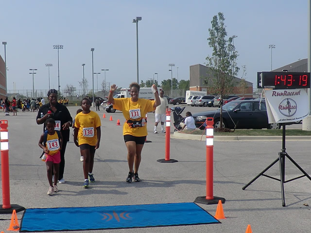 Saturday June 30, 2012 - Runners making the finish of The Great 8K!
