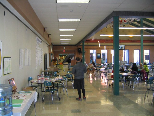Notice the big air mattress being carried towards Tent Gym.