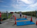 Top participants make their finish line in the inaugural Hoosier Burn Camp 5K Run