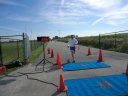 Top participants make their finish line in the inaugural Hoosier Burn Camp 5K Run