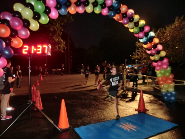 Top participants make their finish line in the inaugural MSW Light Up the Night 5k!