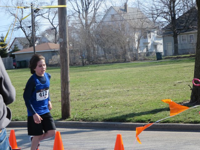 A finish area scene as it happened in Hammond at the 10k/5k Charity Run.