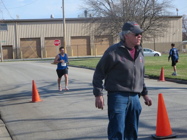 A finish area scene as it happened in Hammond at the 10k/5k Charity Run.