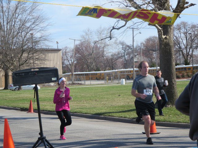 A finish area scene as it happened in Hammond at the 10k/5k Charity Run.